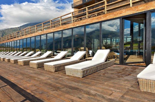 Rooms Hotel Kazbegi, renovated resort, green renovation, brutalist building, green resort, Georgia, Nata Janberidze, Keti Toloraia, luxury hotel, industrial design, terrace, swimming pool