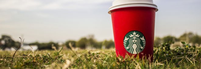 Starbucks, coffee, coffee cup, red coffee cup, red cup, grass, outside, nature