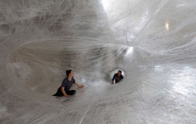 Suspended Tape Structure, Numen/For Use, Tape Art Installation, Des Moines Art Center, Drawing in Space, spider art, hanging art, tape art des moines, art installation, interactive art installation, tape art installation, tape art, tape structures, human scale spider web, spider web art