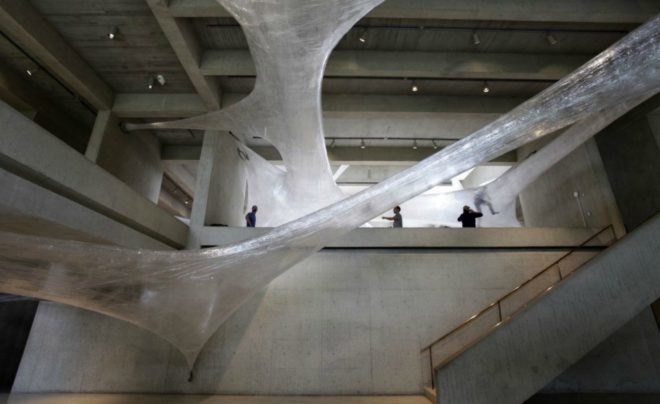 Suspended Tape Structure, Numen/For Use, Tape Art Installation, Des Moines Art Center, Drawing in Space, spider art, hanging art, tape art des moines, art installation, interactive art installation, tape art installation, tape art, tape structures, human scale spider web, spider web art