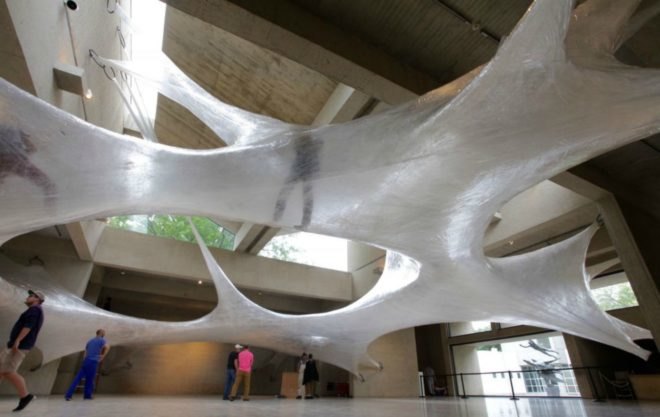 Suspended Tape Structure, Numen/For Use, Tape Art Installation, Des Moines Art Center, Drawing in Space, spider art, hanging art, tape art des moines, art installation, interactive art installation, tape art installation, tape art, tape structures, human scale spider web, spider web art