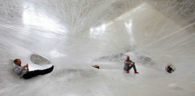 Suspended Tape Structure, Numen/For Use, Tape Art Installation, Des Moines Art Center, Drawing in Space, spider art, hanging art, tape art des moines, art installation, interactive art installation, tape art installation, tape art, tape structures, human scale spider web, spider web art