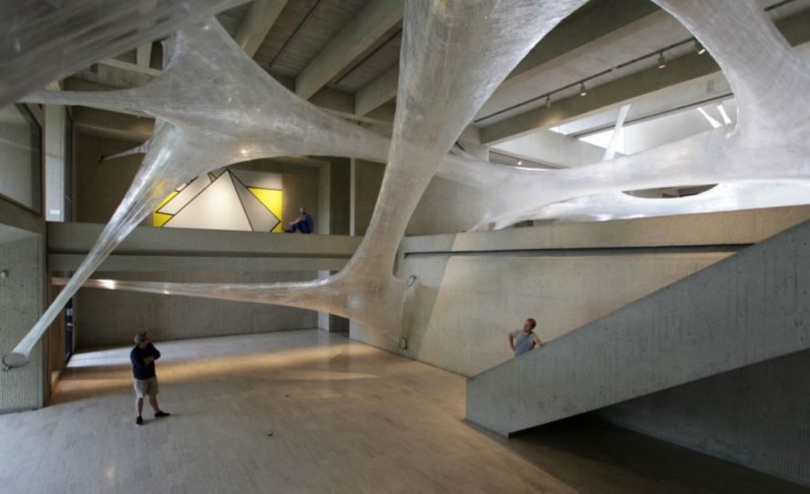 Suspended Tape Structure, Numen/For Use, Tape Art Installation, Des Moines Art Center, Drawing in Space, spider art, hanging art, tape art des moines, art installation, interactive art installation, tape art installation, tape art, tape structures, human scale spider web, spider web art