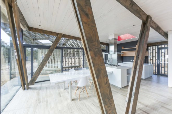 Casa Casi Cubo, L A N D architecture, wooden pavilion, Chile, perforated façade, shelter, pine wood, green architecture, patterns, indoor outdoor living
