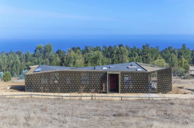 Casa Casi Cubo, L A N D architecture, wooden pavilion, Chile, perforated façade, shelter, pine wood, green architecture, patterns, indoor outdoor living