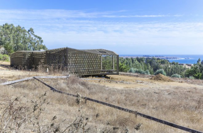 Casa Casi Cubo, L A N D architecture, wooden pavilion, Chile, perforated façade, shelter, pine wood, green architecture, patterns, indoor outdoor living