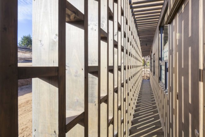 Casa Casi Cubo, L A N D architecture, wooden pavilion, Chile, perforated façade, shelter, pine wood, green architecture, patterns, indoor outdoor living