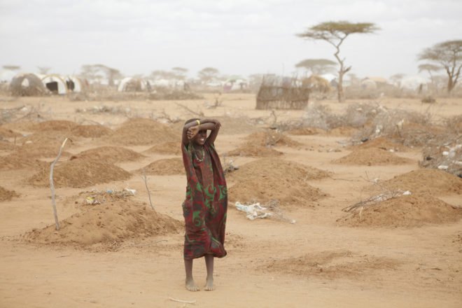 East Africa, drought, girl, graves, camp, malnutrition