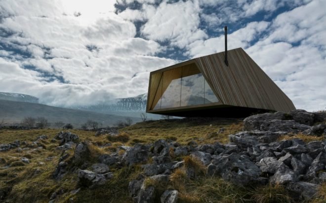 Antony Gibbon, Jutt House, whimsical home design, geometrical home design, geometrical architecture, angular homes, chimneys, black homes, cabin design, nature-inspired designs, sustainable design, green design, floating houses, treehouse series antony gibbon, antony gibbon designs