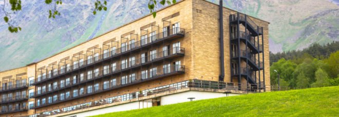 Rooms Hotel Kazbegi, renovated resort, green renovation, brutalist building, green resort, Georgia, Nata Janberidze, Keti Toloraia, luxury hotel, industrial design, terrace, swimming pool