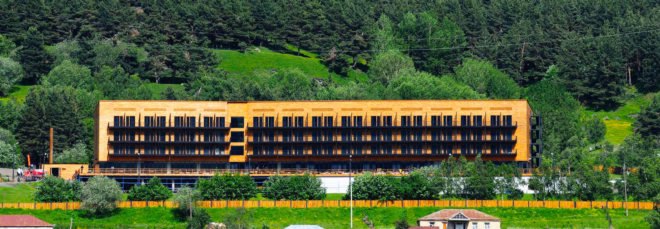 Rooms Hotel Kazbegi, renovated resort, green renovation, brutalist building, green resort, Georgia, Nata Janberidze, Keti Toloraia, luxury hotel, industrial design, terrace, swimming pool
