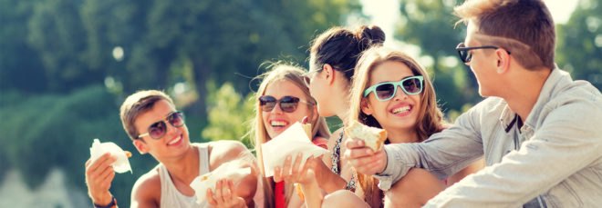 Teens, teenagers, friends, eating, city square, outside, sunglasses