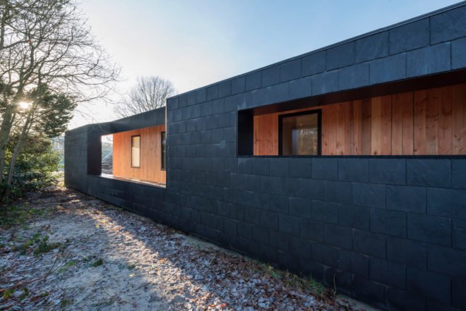 Treldehuset by CEBRA, Treldehuset in Vejle, Vejle contemporary architecture, Danish summer retreat, minimalist architecture in Denmark, minimalist summer getaway, larch and slate architecture,