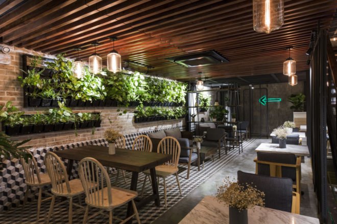 An’garden Café, coffee shop, handing plants, Ha Noi, Vietnam, cement, mezzanine, natural light, indoor pond, green interior, green architecture, industrial architecture
