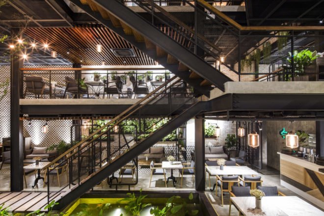 An’garden Café, coffee shop, handing plants, Ha Noi, Vietnam, cement, mezzanine, natural light, indoor pond, green interior, green architecture, industrial architecture