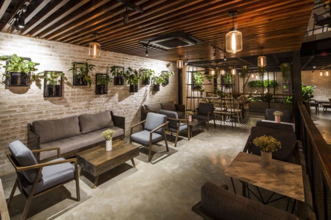 An’garden Café, coffee shop, handing plants, Ha Noi, Vietnam, cement, mezzanine, natural light, indoor pond, green interior, green architecture, industrial architecture