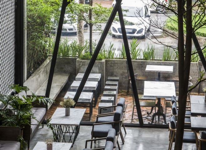 An’garden Café, coffee shop, handing plants, Ha Noi, Vietnam, cement, mezzanine, natural light, indoor pond, green interior, green architecture, industrial architecture