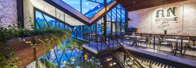 An’garden Café, coffee shop, handing plants, Ha Noi, Vietnam, cement, mezzanine, natural light, indoor pond, green interior, green architecture, industrial architecture