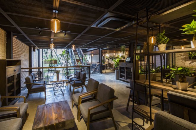 An’garden Café, coffee shop, handing plants, Ha Noi, Vietnam, cement, mezzanine, natural light, indoor pond, green interior, green architecture, industrial architecture