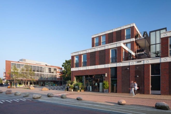 Emoji Architecture by Attika Architekten, emoji gargoyles, emoji in architecture, Emoji Dutch building, Emoji Vathrost architecture, Emoji cast in concrete, Emoji architecture decoration