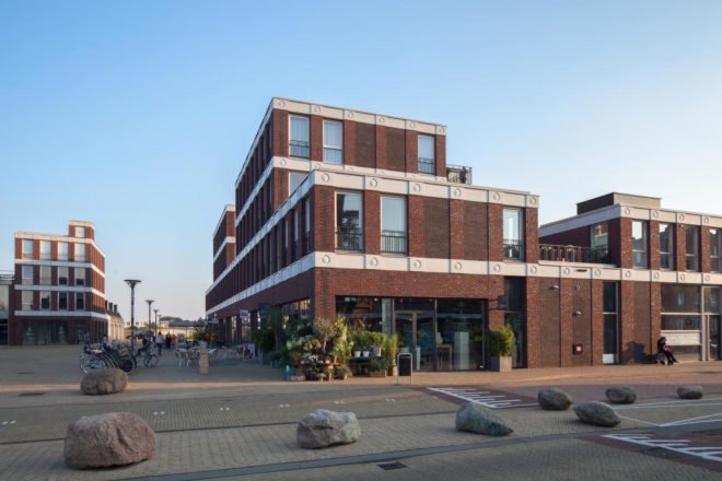 Emoji Architecture by Attika Architekten, emoji gargoyles, emoji in architecture, Emoji Dutch building, Emoji Vathrost architecture, Emoji cast in concrete, Emoji architecture decoration