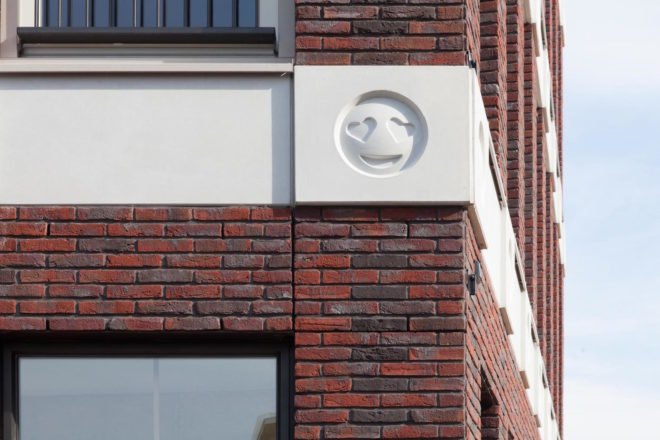 Emoji Architecture by Attika Architekten, emoji gargoyles, emoji in architecture, Emoji Dutch building, Emoji Vathrost architecture, Emoji cast in concrete, Emoji architecture decoration