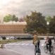 Rendering of two people riding bikes toward the car park
