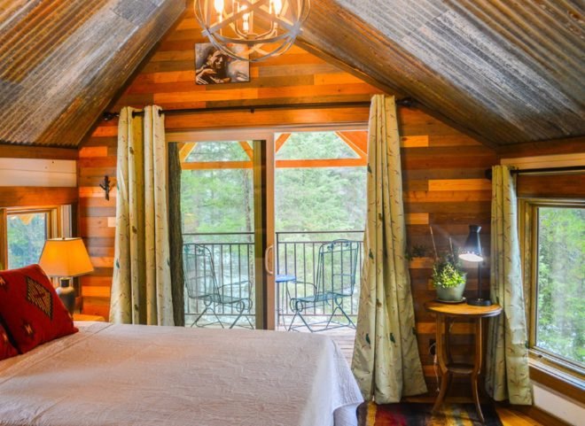 Montana Treehouse Retreat, treehouse, Montana, spiral staircase, green architecture, wooden deck, outdoor lifestyle, Douglas Firs, timber, timber architecture, retreat