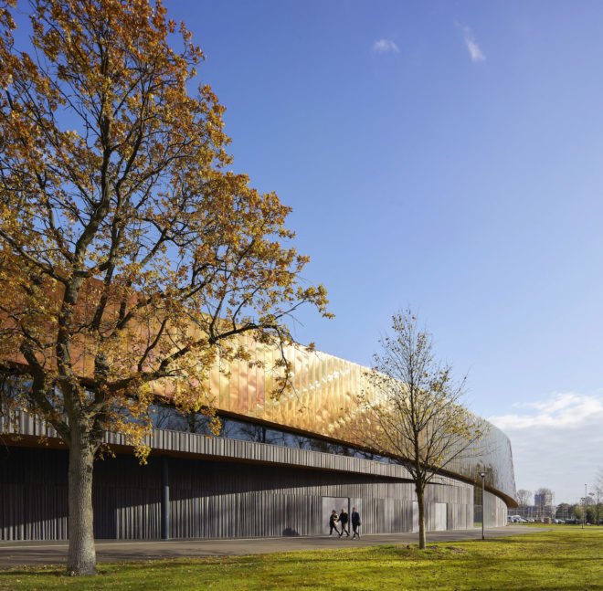 Sportcampus Zuiderpark, Sportcampus Zuiderpark by Faulkner Browns Architects, ecofriendly sports campus, ecofriendly sports park, Zuiderpark architecture, The Hague sustainable architecture, green roof solar powered sports facility