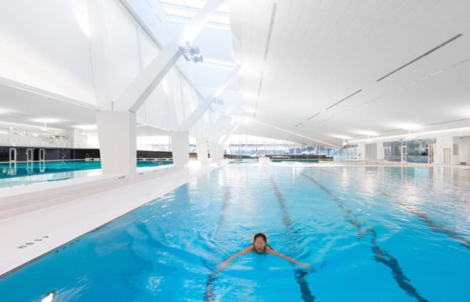 UBC Aquatic Center by MJMA, UBC Aquatic Center LEED Gold, LEED Gold aquatic center, LEED swimming center, University of British Columbia aquatics center, sustainable swimming facility, sustainable water reuse for pools, rainwater collection ad reuse for aquatics center
