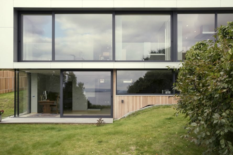 Skapa architects, Villa Bergheimveien, Norway's Snarøya peninsula, Moelven prefabricated house, home renovation, prefab homes, modular prefab renovation in norway, Norwegian architects, Moelven modular prefab, cedar board cladding, wooden cladding, home additions, home renovation ideas, how to renovate a prefab home, cedar cladding,