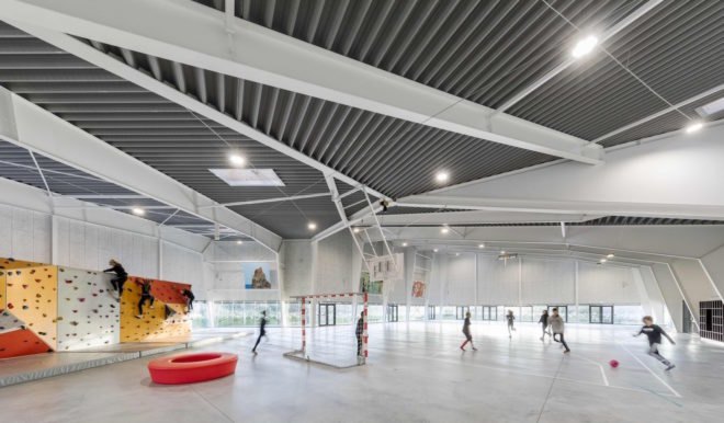 Ørestad City sports center by NORD Architects, Ørestad City sports facility, Ørestad City new architecture, green roofed sports center, timber clad architecture in Ørestad City, contemporary timber public architecture, Copenhagen sports center,