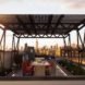 The Solar Canopy is lofted over a dining area in this rendering.