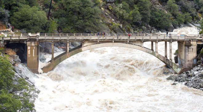 Flood under the Old Route 49 bridge crossing over the South Yuba River in Nevada City, California