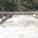 Flood under the Old Route 49 bridge crossing over the South Yuba River in Nevada City, California