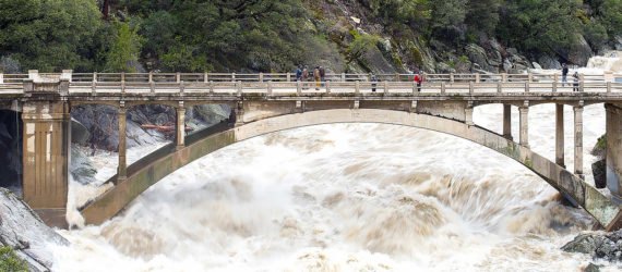 Flood under the Old Route 49 bridge crossing over the South Yuba River in Nevada City, California