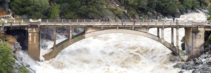 Flood under the Old Route 49 bridge crossing over the South Yuba River in Nevada City, California