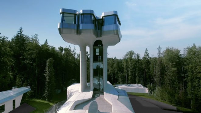 Exterior image of the home, which features a tall tower.