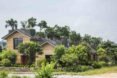 Dong Anh House by Vo Trong Nghia Architects, Dong Anh House in Hanoi, Dong Anh House in Vietnam, rammed earth modern architecture, rammed earth architecture in Hanoi, rammed earth housing in Vietnam, contemporary rammed earth house, fruit trees on a roof,
