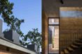 Dong Anh House by Vo Trong Nghia Architects, Dong Anh House in Hanoi, Dong Anh House in Vietnam, rammed earth modern architecture, rammed earth architecture in Hanoi, rammed earth housing in Vietnam, contemporary rammed earth house, fruit trees on a roof,