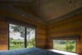 Dong Anh House by Vo Trong Nghia Architects, Dong Anh House in Hanoi, Dong Anh House in Vietnam, rammed earth modern architecture, rammed earth architecture in Hanoi, rammed earth housing in Vietnam, contemporary rammed earth house, fruit trees on a roof,