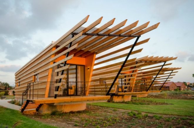An image of the exterior of the bungalows at sunset.