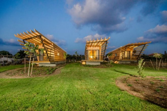 Three bungalows made from timber.