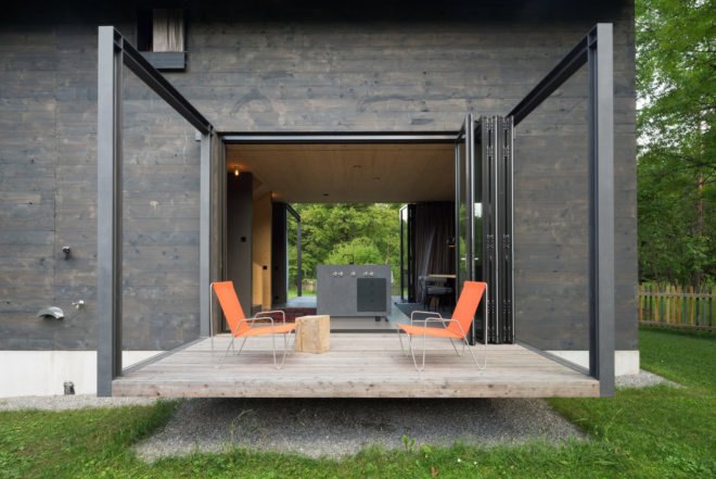 terrace features bright orange patio chairs