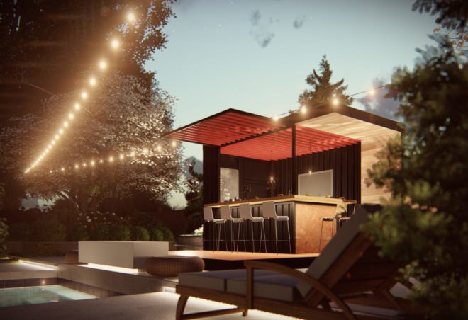 The transportable bar sits in front of a pool at night.