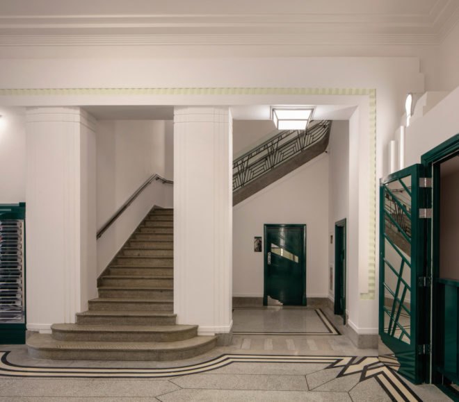 Art Deco Hoover Building, Hoover Building apartments, Hoover Building renovation by Interrobang, Hoover Building adaptive reuse, art deco adaptive reuse, art deco renovated apartments, prefabricated timber trusses maximizing space, terrazzo art deco