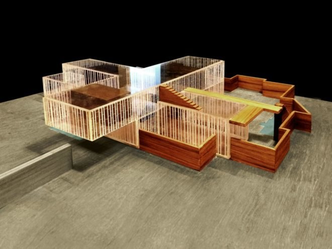 Model of the cross-shaped layout of the home.