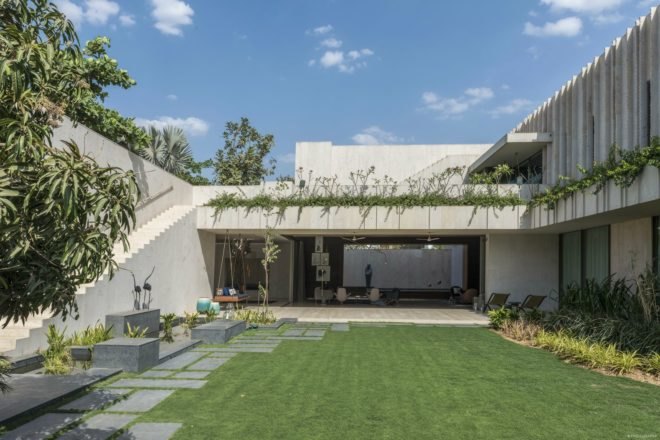 The inside of the home is open, leading directly to the gardens outside.