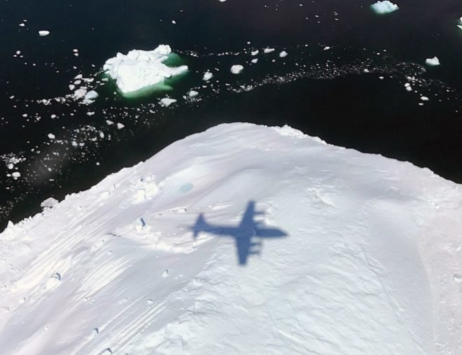 The shadow of NASA's P-3 plane supporting Operation IceBridge