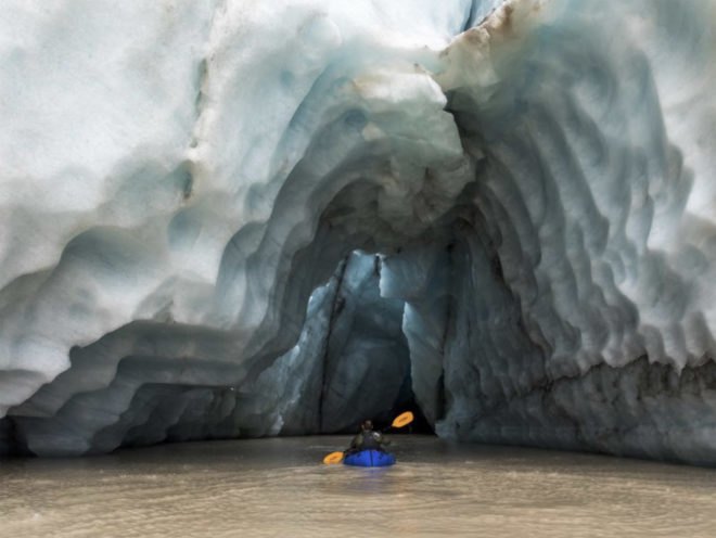 Mark Jenkins kayaks into the underside of a glacier in Alaska’s Wrangell-St. Elias National Park